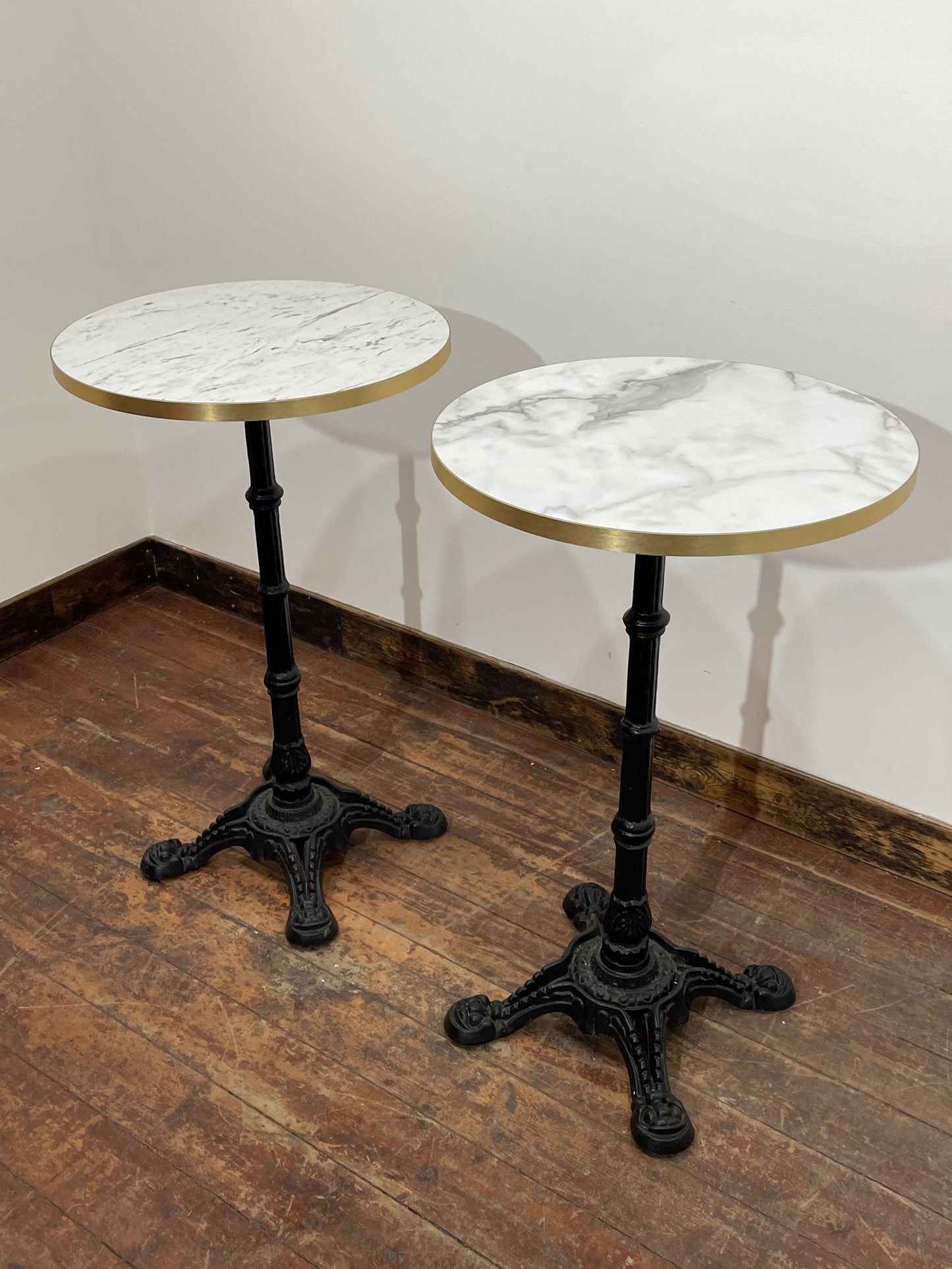 Pair of High Bar Poseur Tables Marble Effect Tops Gold Edge Cast Iron Bases