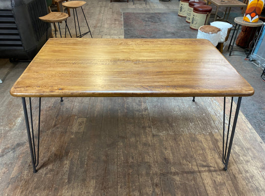 Stylish mango wood dining table with metal legs