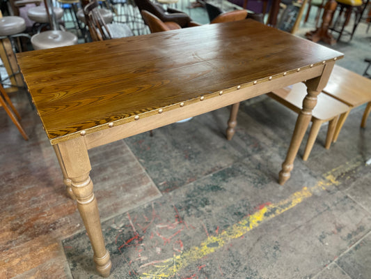 Rectangular poseur table with brass stud detail
