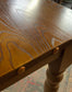 Rectangular poseur table with brass stud detail