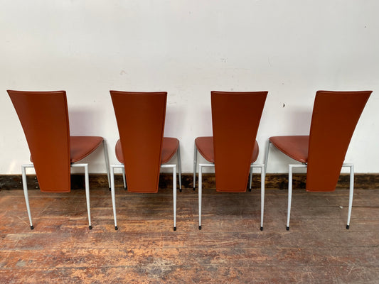Set of four Italian leather dining chairs