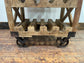 Industrial style wine rack on wheels