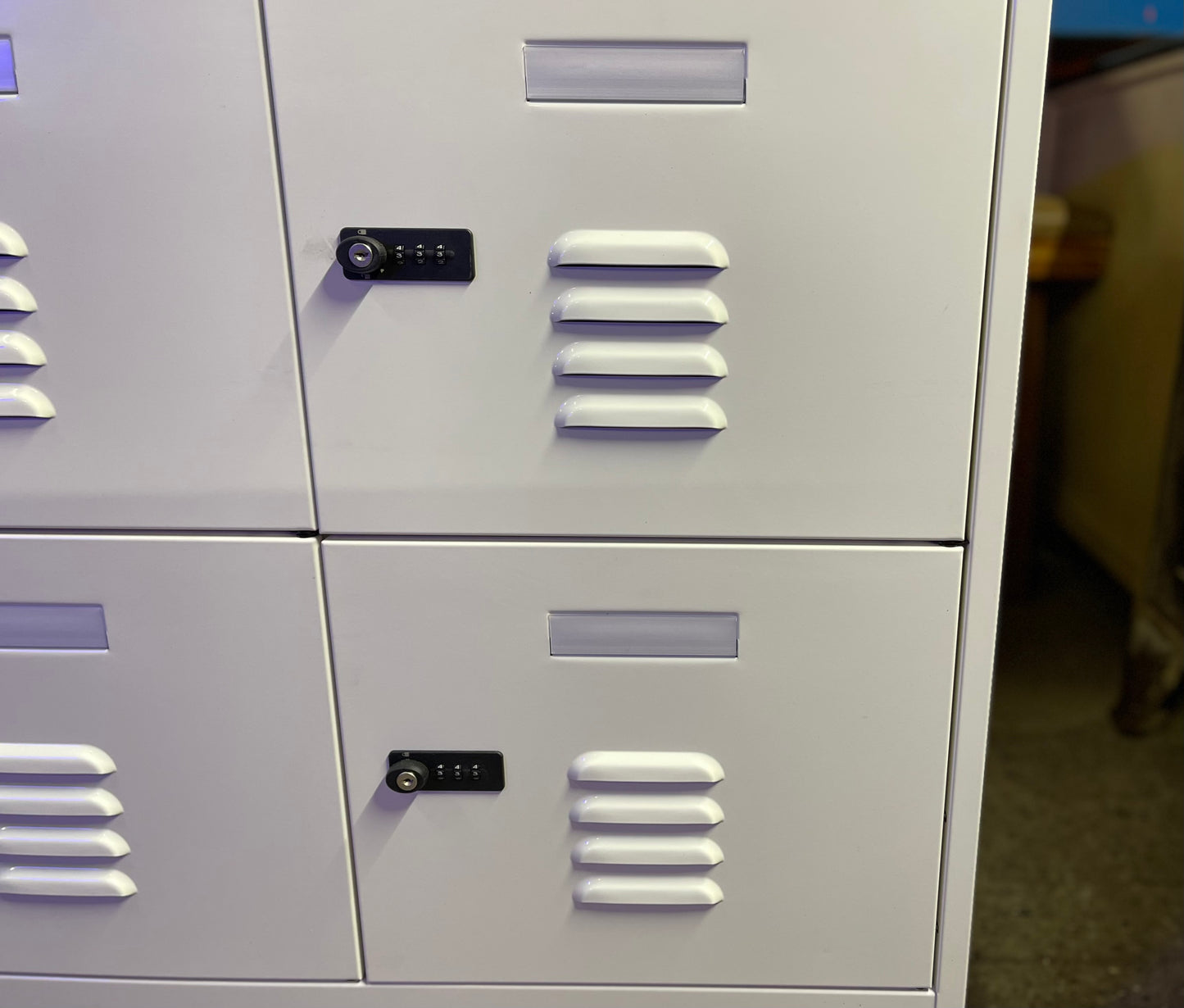 White metal cabinet with 6 individual lockers