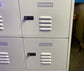 White metal cabinet with 6 individual lockers