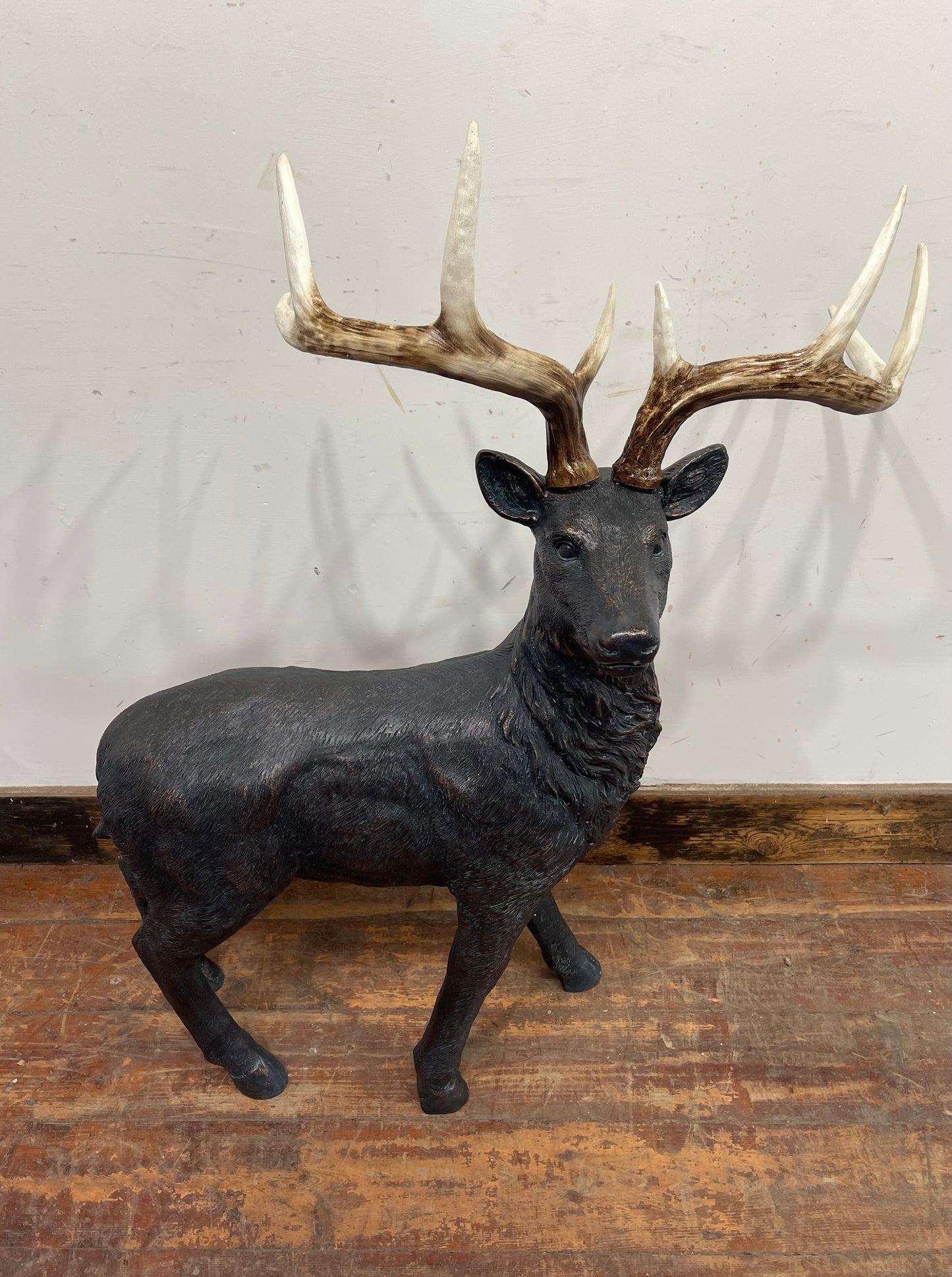 Red and gold Christmas sleigh including reindeer figure