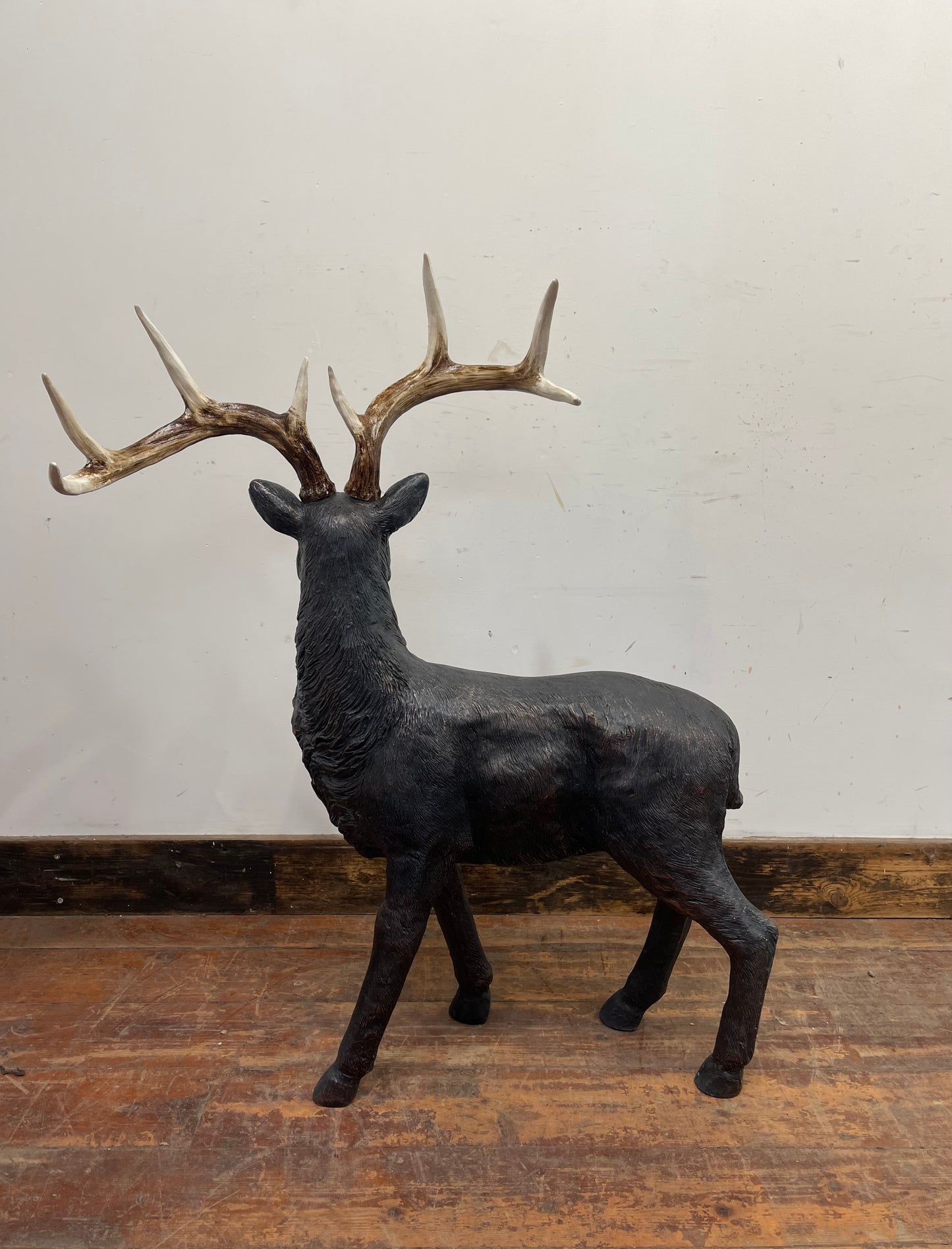 Red and gold Christmas sleigh including reindeer figure