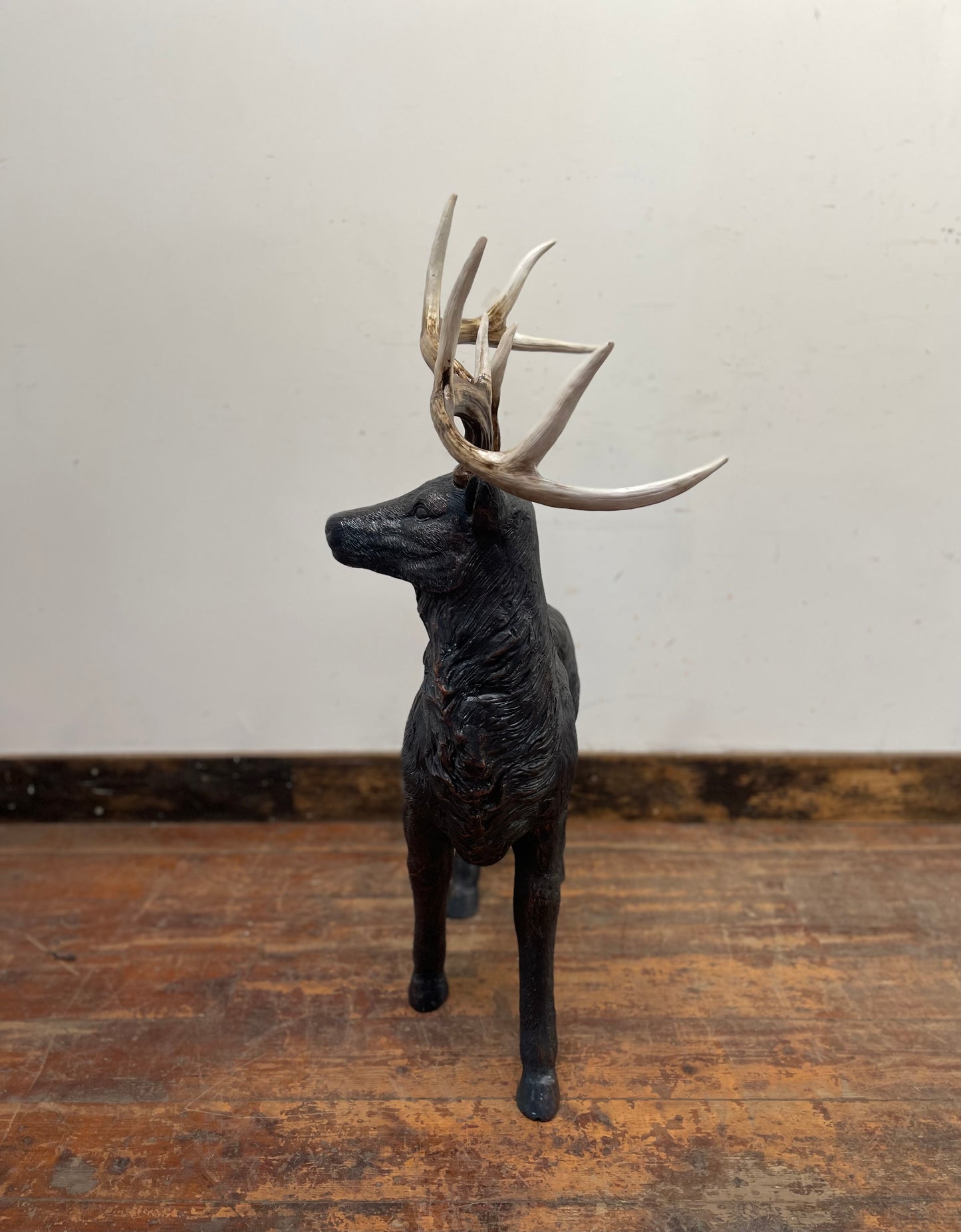 Red and gold Christmas sleigh including reindeer figure