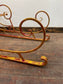 Large red and gold metal Christmas sleigh