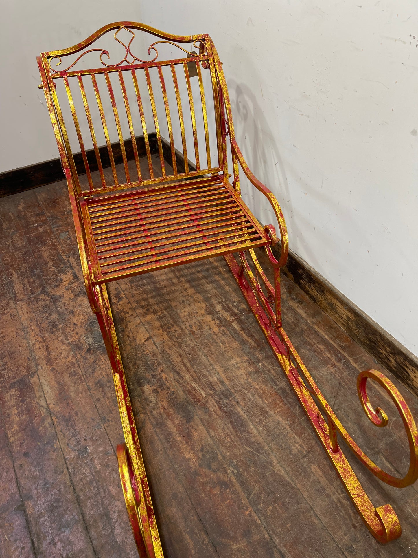 Large red and gold metal Christmas sleigh