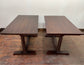 Pair of rectangular wooden pub tables with decorative legs