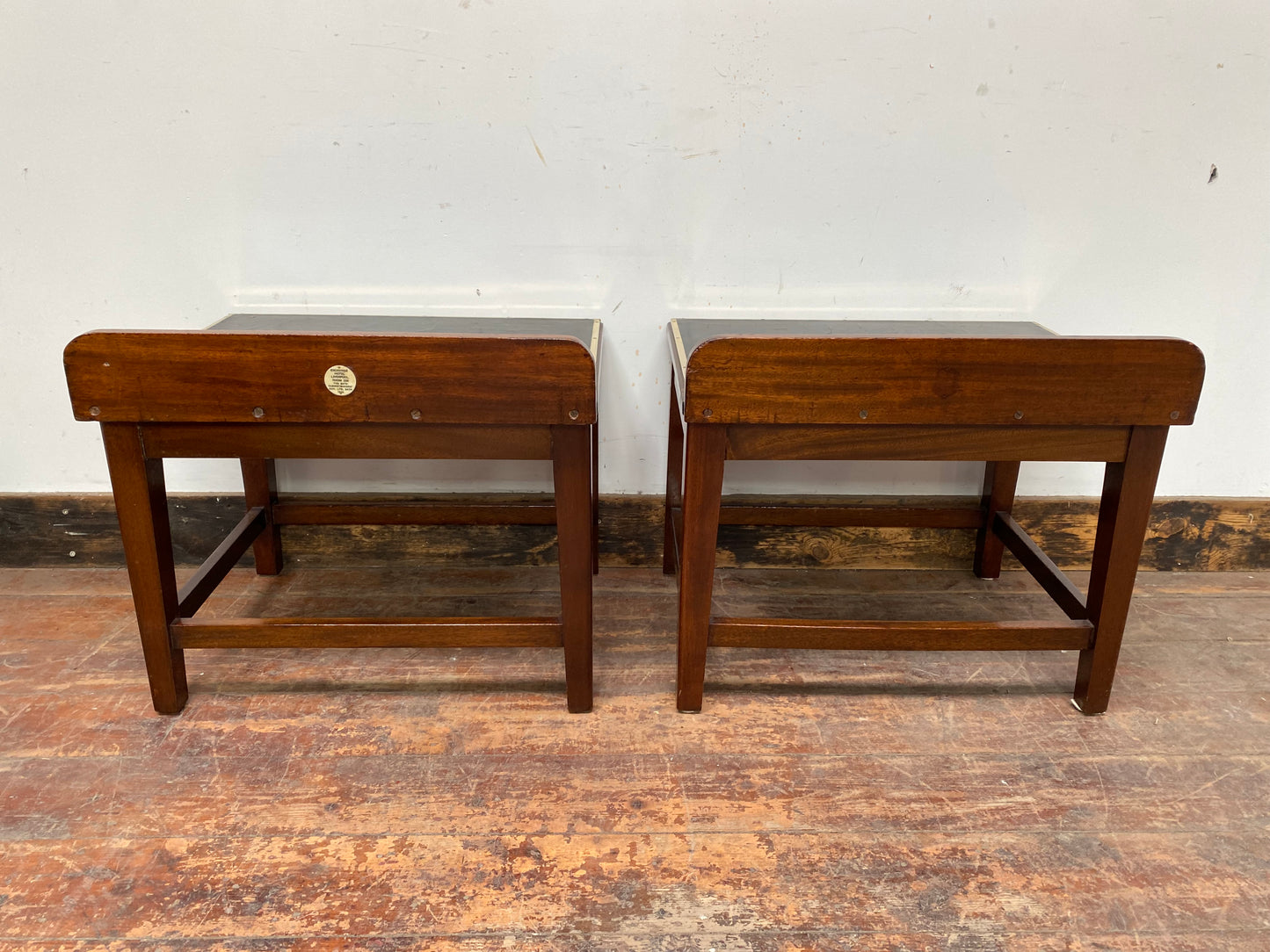 Pair of antique 1940s black leather and gold side tables