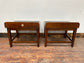 Pair of antique 1940s black leather and gold side tables