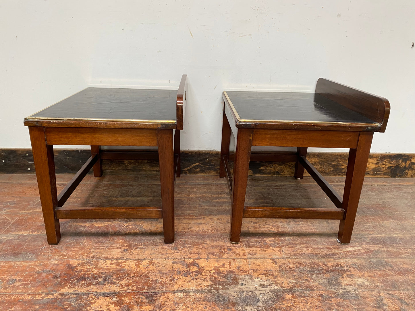 Pair of antique 1940s black leather and gold side tables