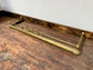 Ornate antique brass fire fender
