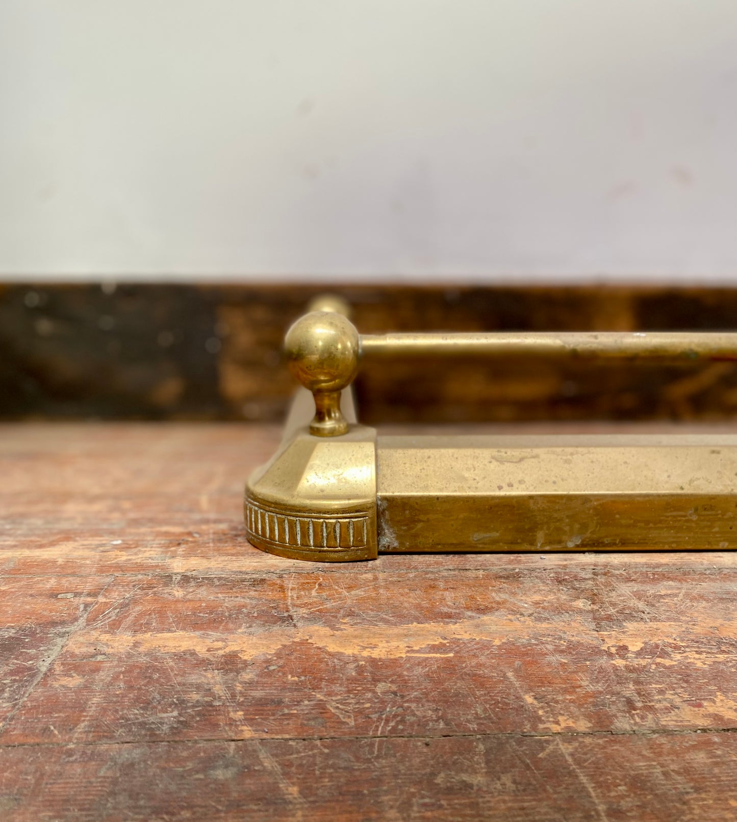 Ornate antique brass fire fender