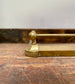Ornate antique brass fire fender