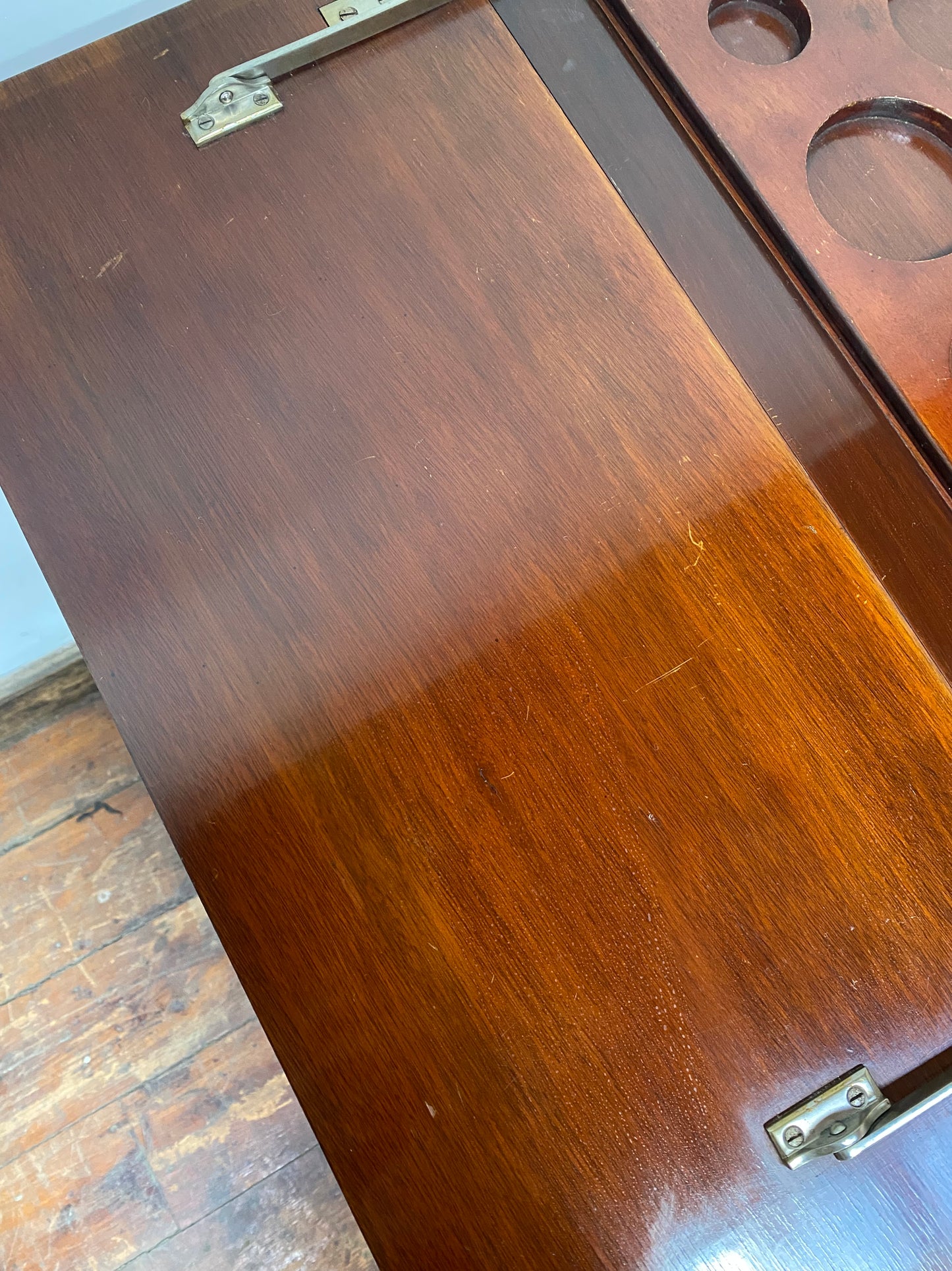Antique 'rise and fall' hidden drinks cabinet