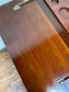 Antique 'rise and fall' hidden drinks cabinet
