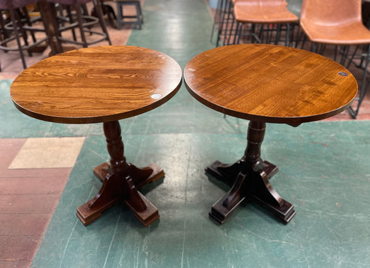 Pair of small round wooden pub tables