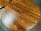 Pair of small round wooden pub tables