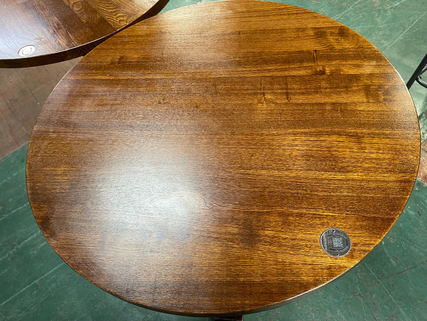 Pair of small round wooden pub tables