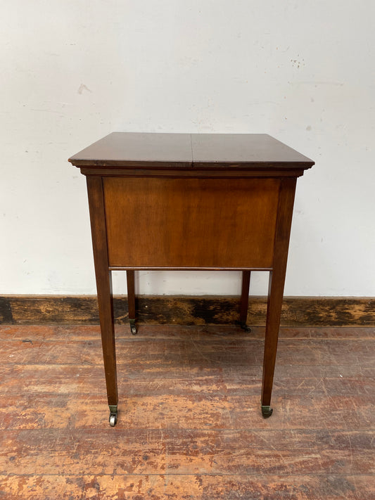 Antique 'rise and fall' hidden drinks cabinet