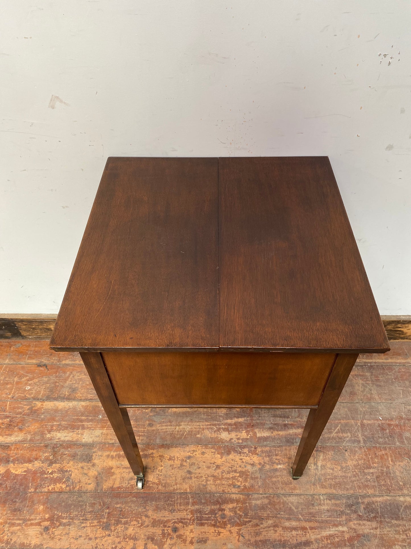 Antique 'rise and fall' hidden drinks cabinet