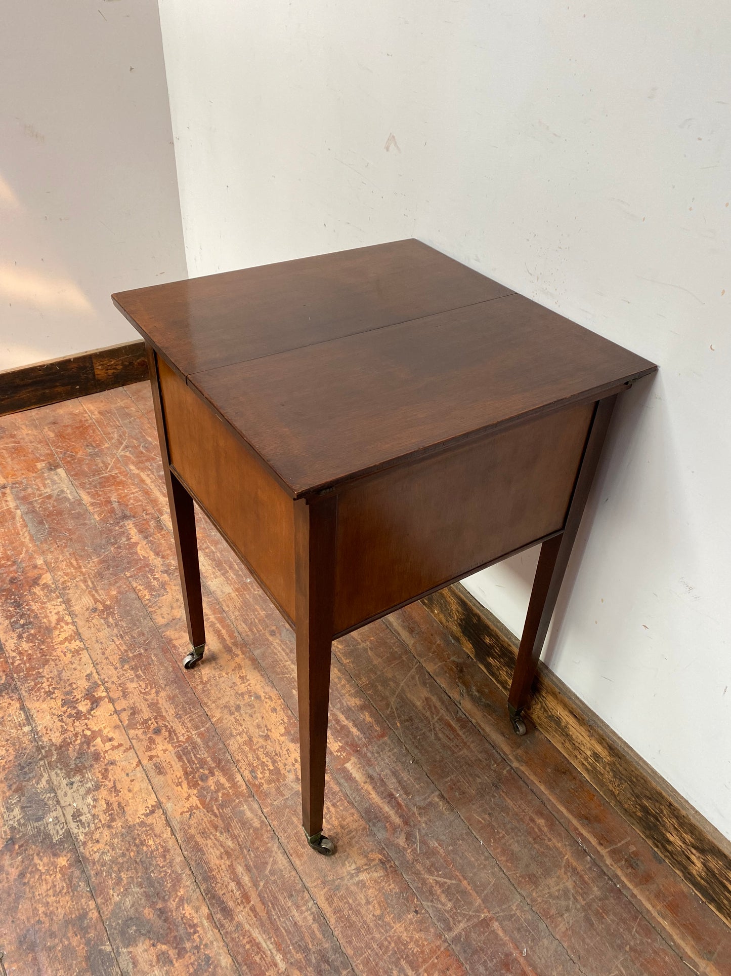 Antique 'rise and fall' hidden drinks cabinet