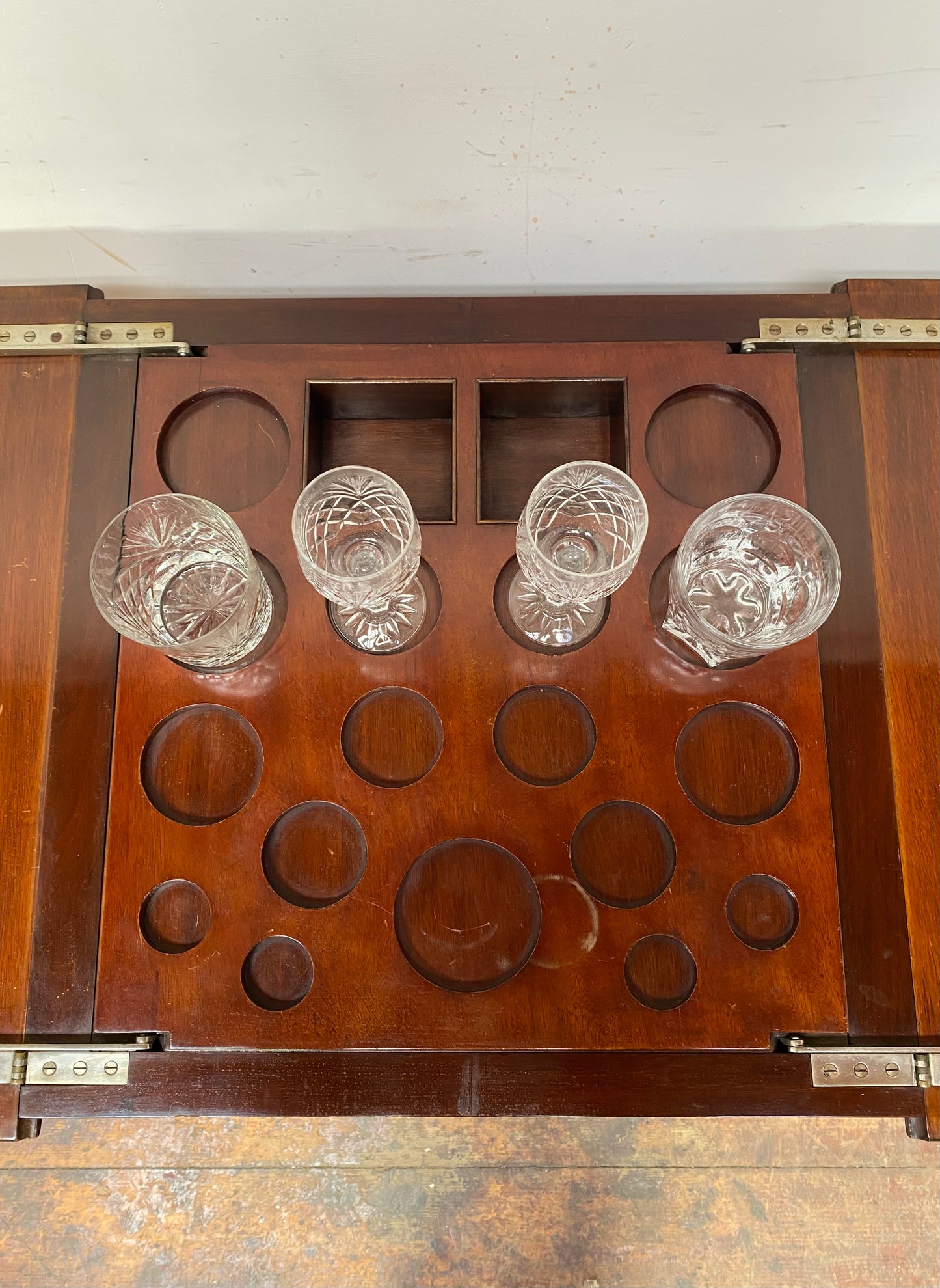 Antique 'rise and fall' hidden drinks cabinet