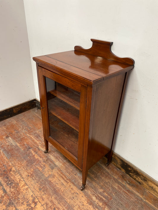 Small antique cabinet with glass door and castors