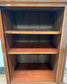 Small antique cabinet with glass door and castors