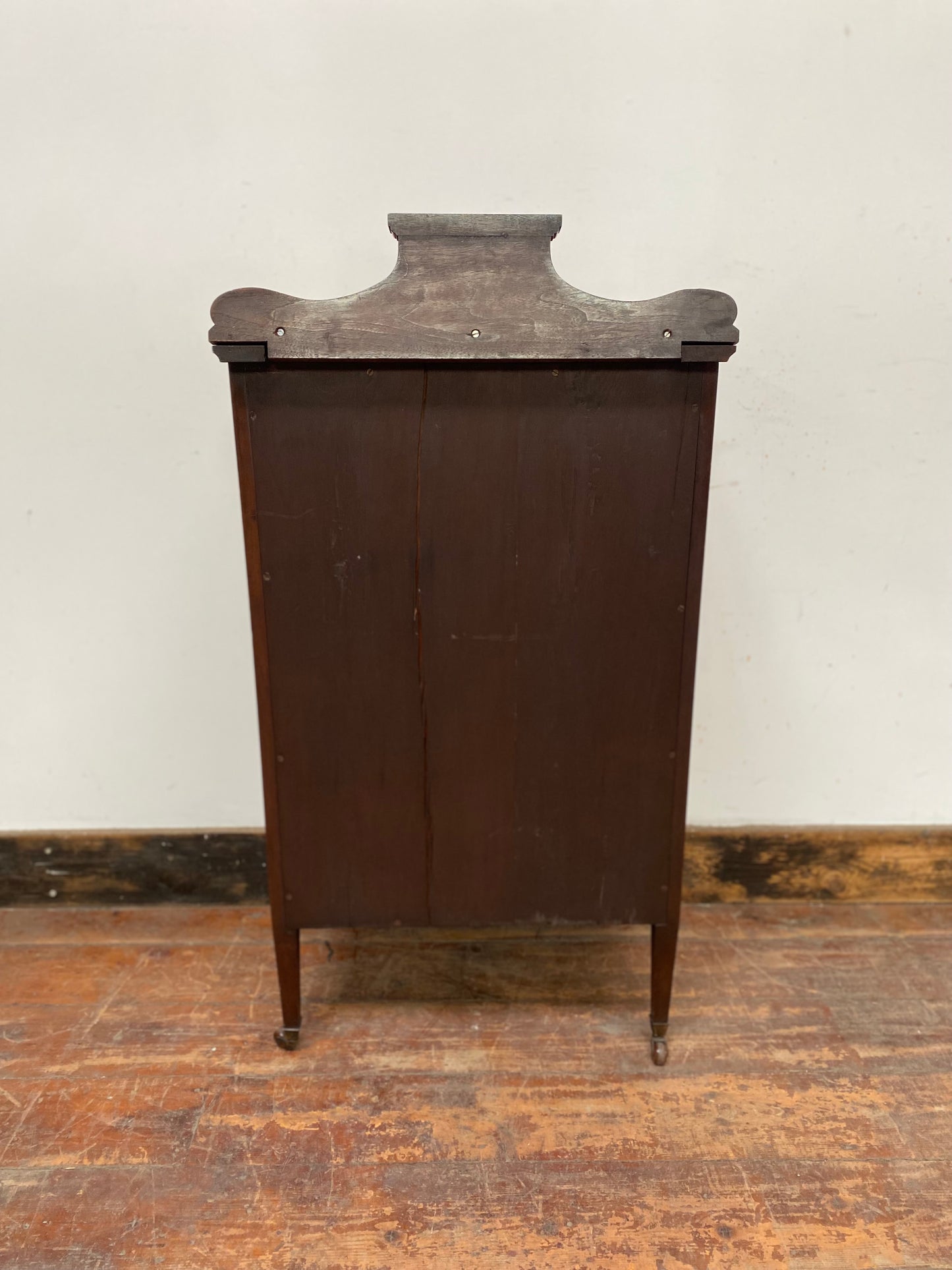Small antique cabinet with glass door and castors