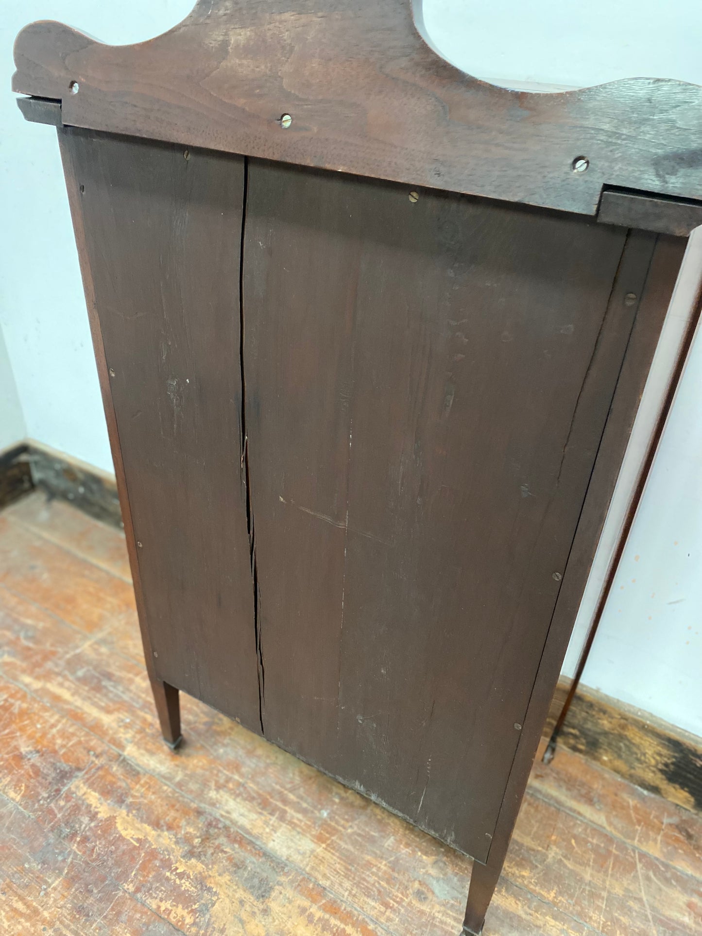 Small antique cabinet with glass door and castors