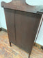 Small antique cabinet with glass door and castors