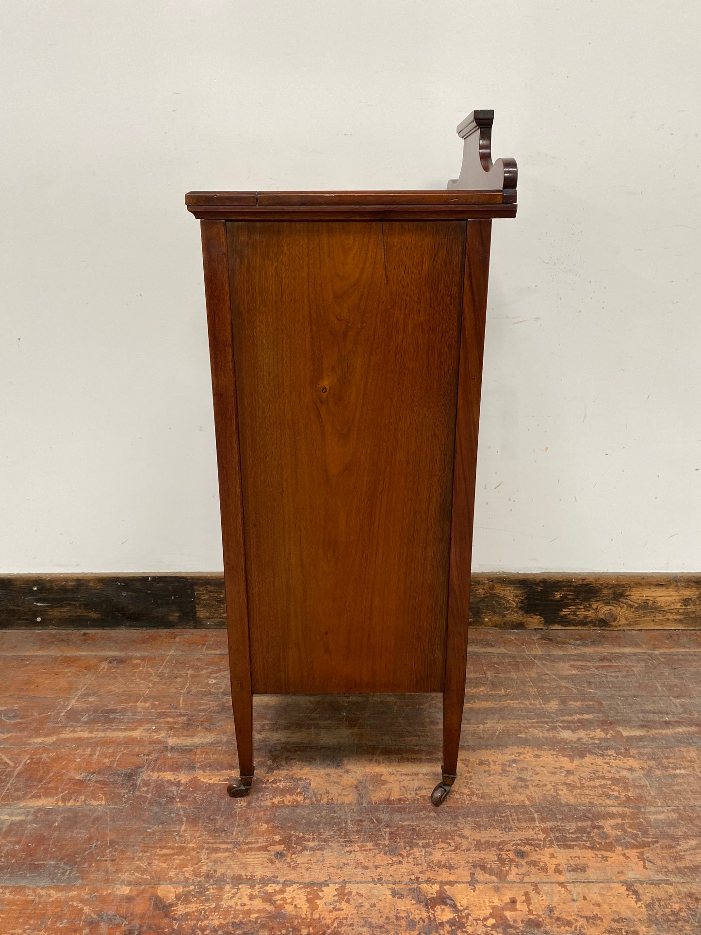 Small antique cabinet with glass door and castors