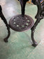 Cast iron pub table with 'lady face' and wooden top