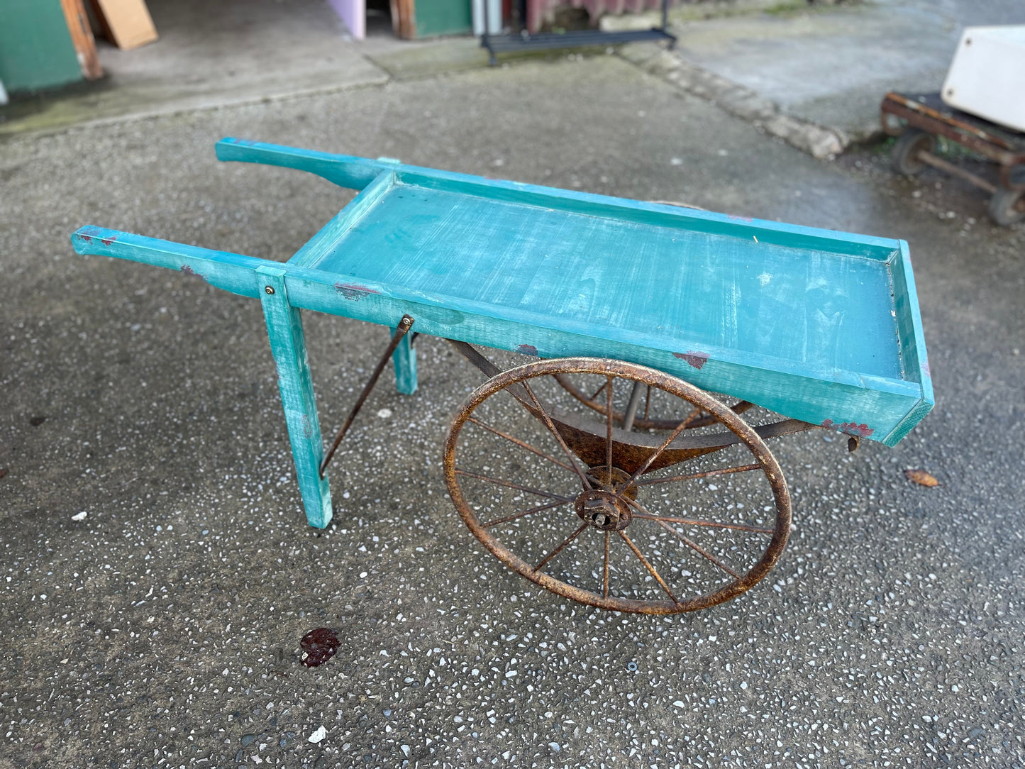 Vintage style display handcart with metal wheels