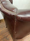 Stunning matching pair of brown leather wingback armchairs