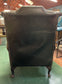 Beautiful wingback armchair in black leather