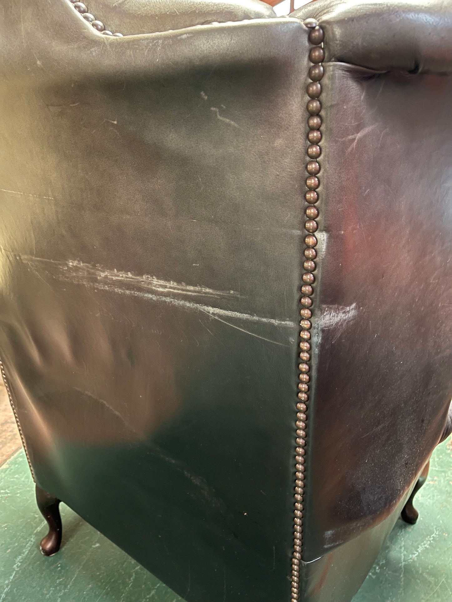 Beautiful wingback armchair in black leather