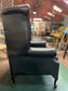 Beautiful wingback armchair in black leather