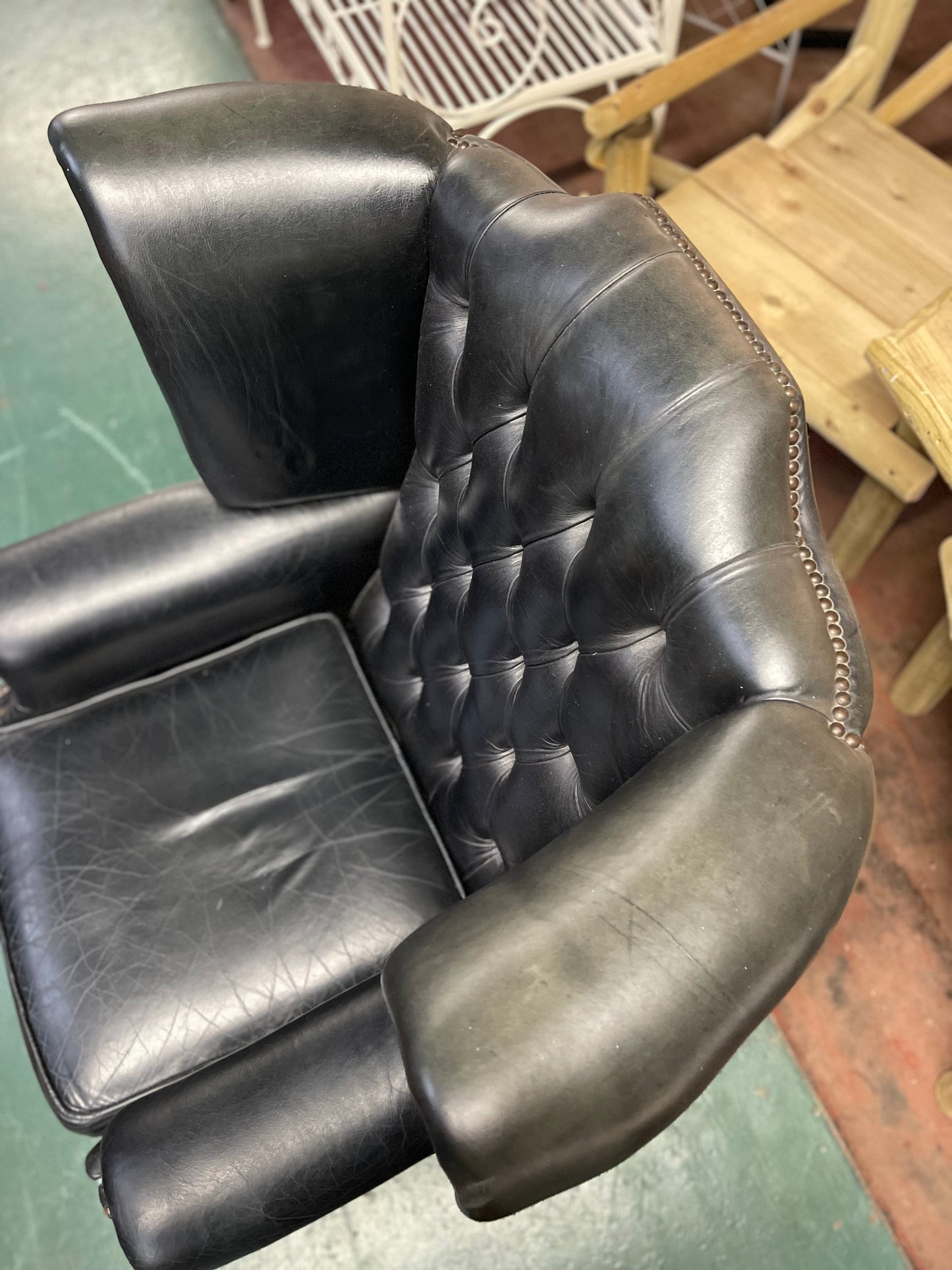 Beautiful wingback armchair in black leather