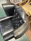 Beautiful wingback armchair in black leather