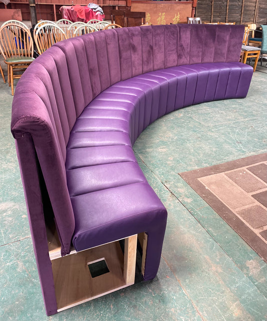 Fixed purple bench / booth seating with channel back