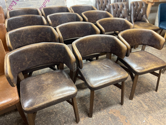 Matching set of 12 brown leather pub chairs