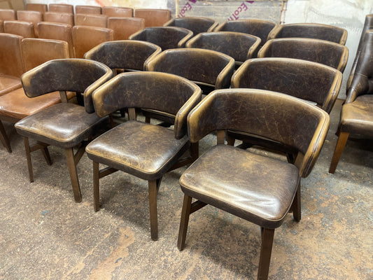Matching set of 12 brown leather pub chairs