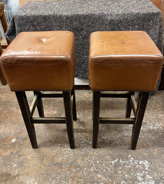 Pair of square tan leather bar stools