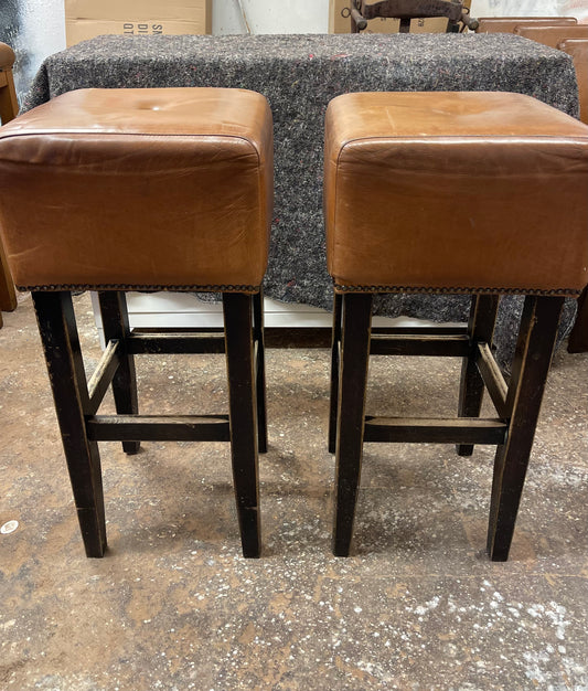 Pair of square tan leather bar stools