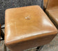 Pair of square tan leather bar stools
