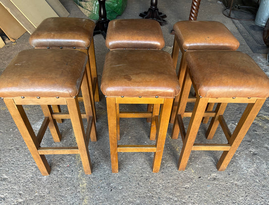 Matching set of 6 tan leather bar stools with square tops
